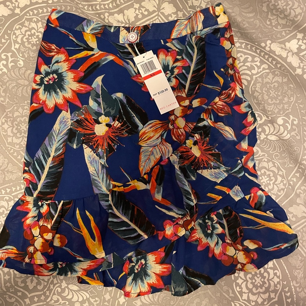 New with tags red carter skirt size xs. Super cute print and ruffle for spring.